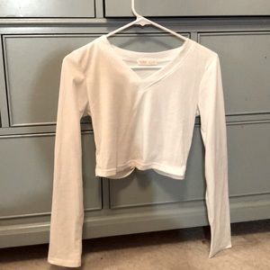 White long sleeved v neck shirt